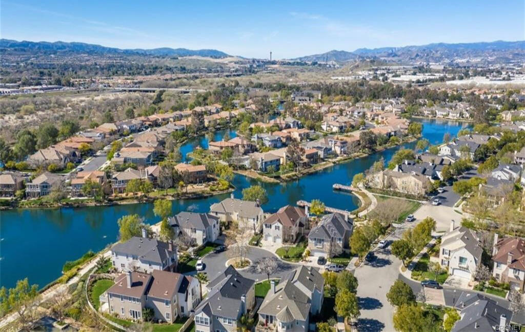 The waterfront homes at Bridgeport Valencia are fed by mini waterfalls to churn the water and eliminate pests.